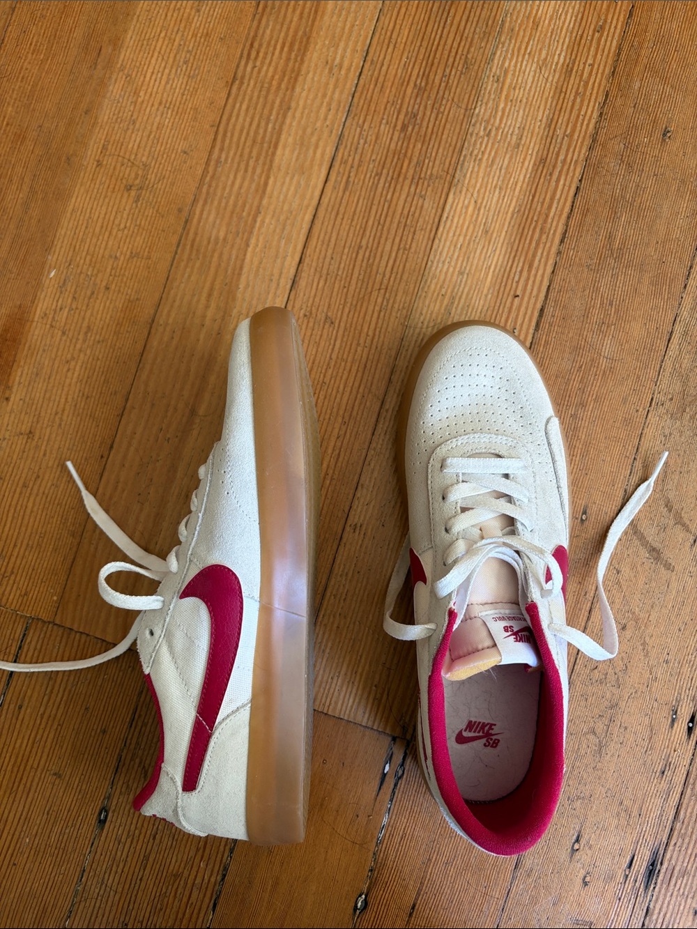 Never worn men’s Nike White Sneakers with red Swoosh, size 9.5